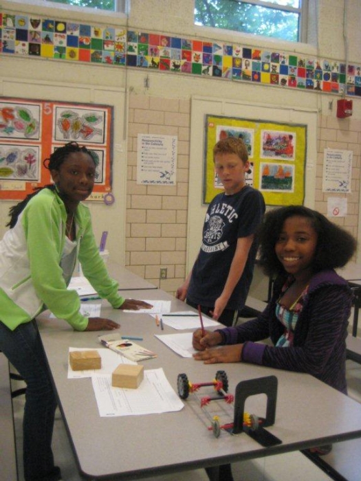 Downes Elementary 5th graders working on a team project